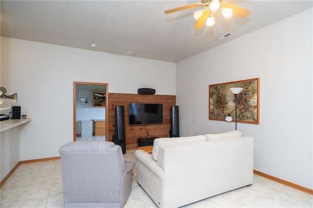 1672 N 1st Rd, Baldwin City, KS 66006 - living area with ceiling fan, baseboards, and light tile patterned floors