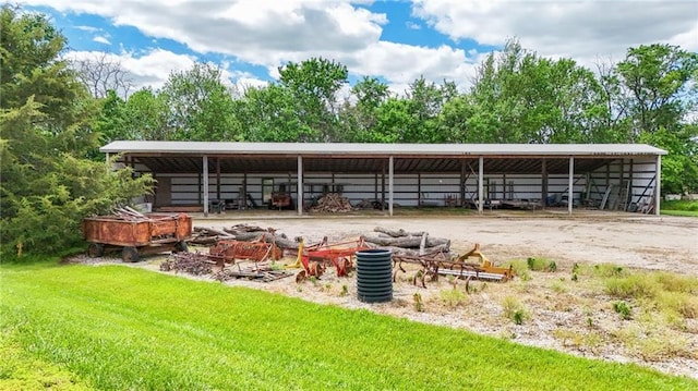 1672 N 1st Rd, Baldwin City, KS 66006 - view of car parking featuring an outbuilding