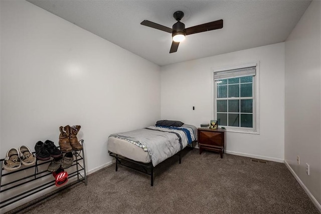 624 Mcdonald Rd, Leavenworth, KS 66048 - bedroom featuring carpet floors, baseboards, and ceiling fan