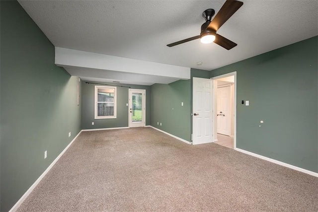 624 Mcdonald Rd, Leavenworth, KS 66048 - carpeted spare room with baseboards and a ceiling fan