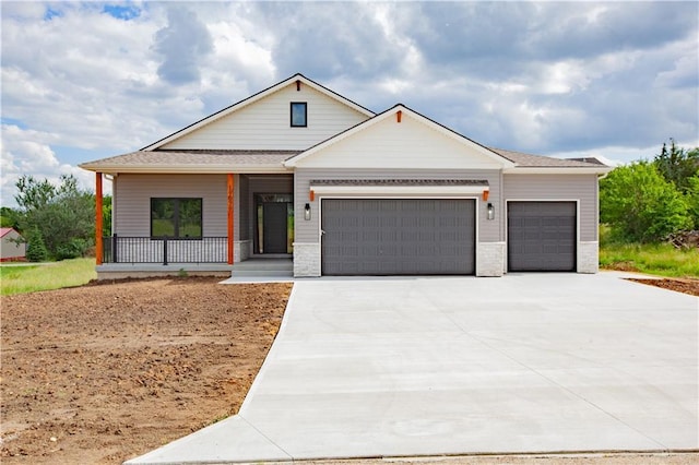 19079 Millstone Ter, Saint Joseph, MO 64505 - modern farmhouse with an attached garage, driveway, and a porch