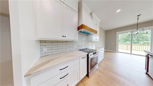 19079 Millstone Ter, Saint Joseph, MO 64505 - kitchen featuring stainless steel range with electric cooktop, custom exhaust hood, decorative backsplash, light wood finished floors, and light stone countertops