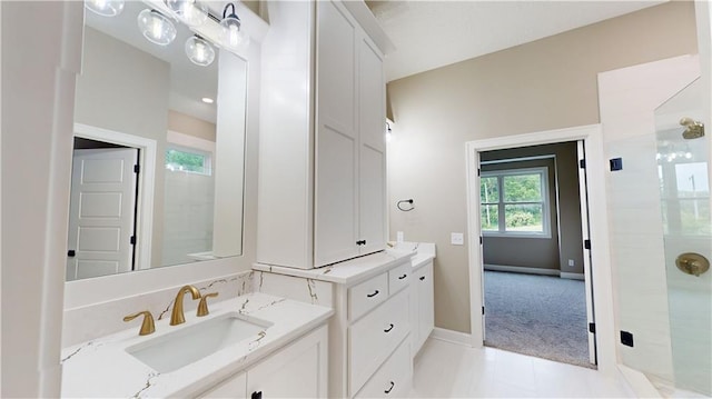 19079 Millstone Ter, Saint Joseph, MO 64505 - full bathroom with vanity, an enclosed shower, baseboards, and tile patterned floors