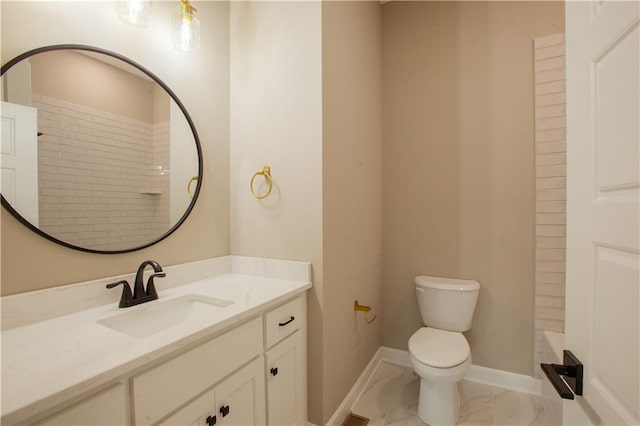 19079 Millstone Ter, Saint Joseph, MO 64505 - bathroom with vanity, toilet, marble finish flooring, baseboards, and bathing tub / shower combination