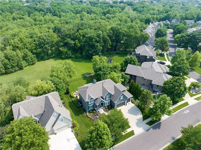 12349 Westgate St, Overland Park, KS 66213 - aerial perspective of suburban area featuring a heavily wooded area