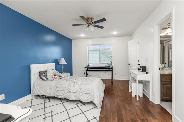 8909 SE 1st St, Blue Springs, MO 64064 - bedroom featuring wood finished floors, baseboards, ceiling fan, recessed lighting, and ensuite bath