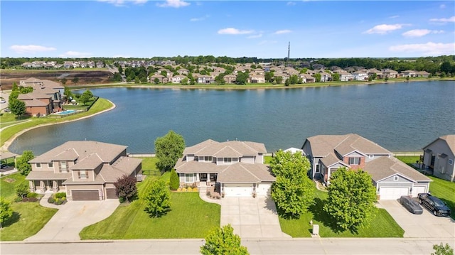 8909 SE 1st St, Blue Springs, MO 64064 - aerial perspective of suburban area featuring a nearby body of water