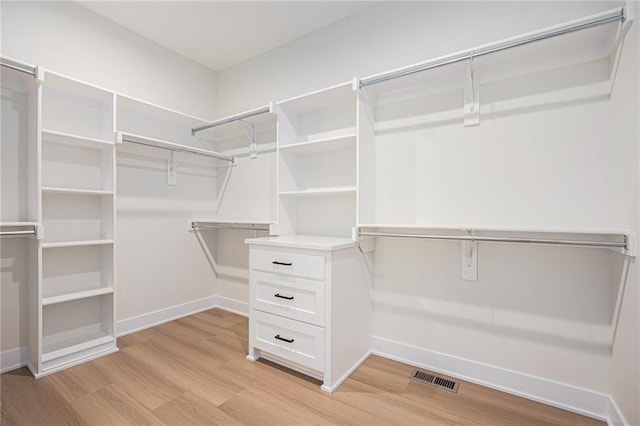 6932 Kenton St, Shawnee, KS 66226 - walk in closet featuring light wood-style floors