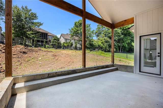 6932 Kenton St, Shawnee, KS 66226 - unfurnished sunroom featuring lofted ceiling