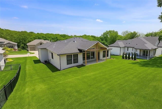 6932 Kenton St, Shawnee, KS 66226 - back of house featuring a residential view