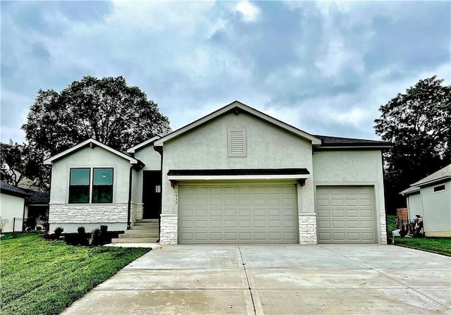 6932 Kenton St, Shawnee, KS 66226 - single story home featuring an attached garage, stone siding, driveway, and stucco siding