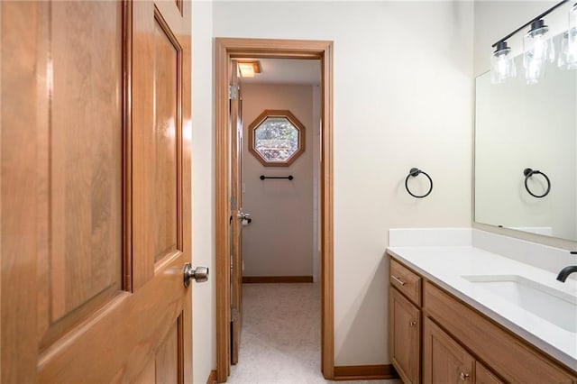2101 Riviera Dr, Lawrence, KS 66047 - bathroom featuring vanity and baseboards