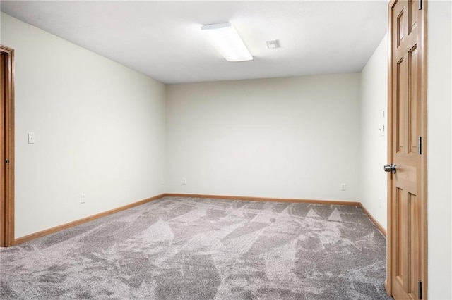 2101 Riviera Dr, Lawrence, KS 66047 - spare room with carpet and baseboards