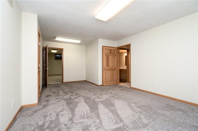 2101 Riviera Dr, Lawrence, KS 66047 - carpeted spare room featuring baseboards