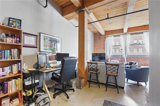 712 Broadway Blvd Unit 607, Kansas City, MO 64105 - home office with wood ceiling with exposed beams and finished concrete floors