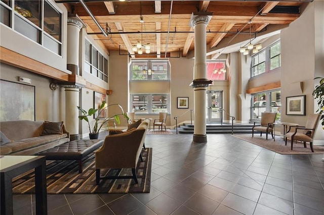 712 Broadway Blvd Unit 607, Kansas City, MO 64105 - common area featuring wood ceiling with exposed beams and a towering ceiling