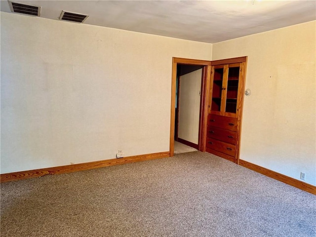 211 Park Ave, Parsons, KS 67357 - unfurnished room with carpet floors and baseboards