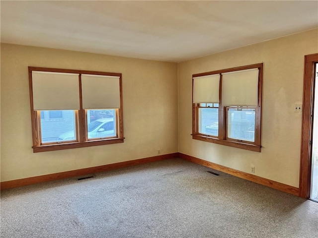 211 Park Ave, Parsons, KS 67357 - empty room featuring carpet and baseboards