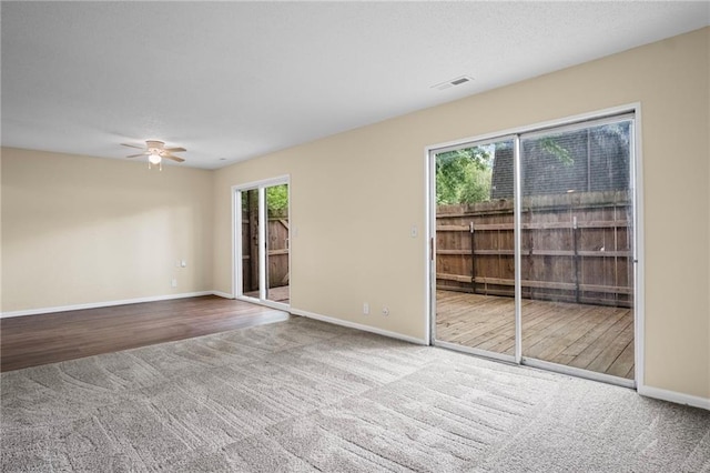3729 Brush Creek Dr N, Lawrence, KS 66047 - empty room featuring carpet flooring, plenty of natural light, ceiling fan, and baseboards