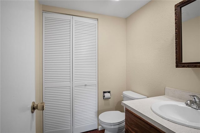 3729 Brush Creek Dr N, Lawrence, KS 66047 - bathroom featuring a closet, vanity, and toilet
