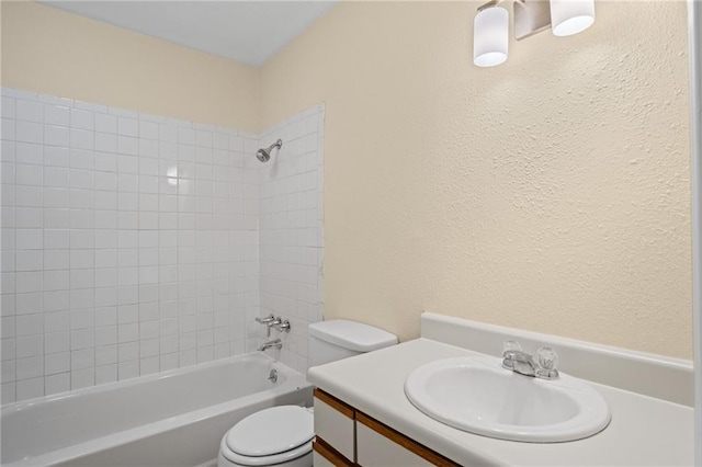 3729 Brush Creek Dr N, Lawrence, KS 66047 - bathroom featuring toilet, vanity, shower / tub combination, and a textured wall