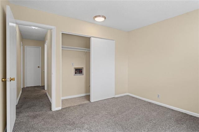 3729 Brush Creek Dr N, Lawrence, KS 66047 - unfurnished bedroom with carpet flooring, a closet, and baseboards