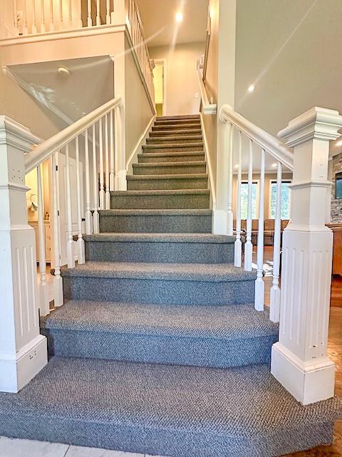 1101 SW Sunflower Dr, Lees Summit, MO 64081 - stairway with recessed lighting