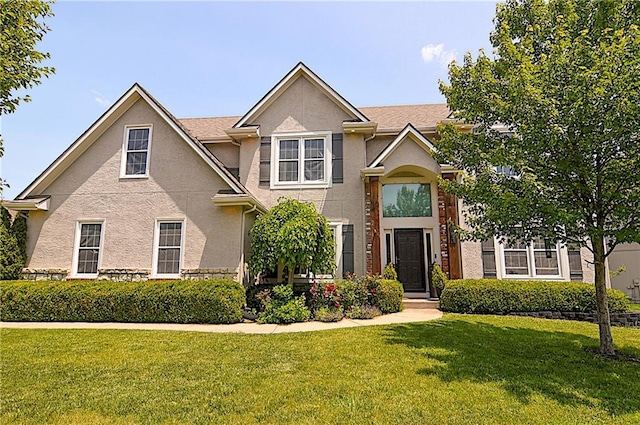 1101 SW Sunflower Dr, Lees Summit, MO 64081 - traditional home with stucco siding and a front lawn