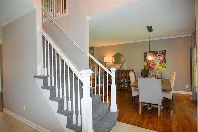 1101 SW Sunflower Dr, Lees Summit, MO 64081 - staircase with crown molding, tile patterned floors, and baseboards