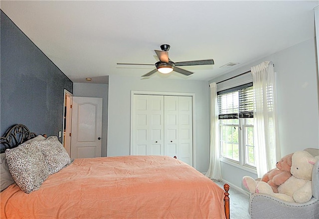 1101 SW Sunflower Dr, Lees Summit, MO 64081 - bedroom featuring carpet floors, a closet, and ceiling fan