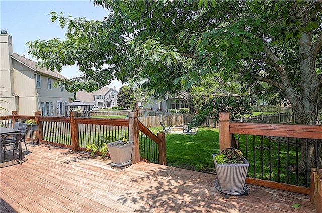 1101 SW Sunflower Dr, Lees Summit, MO 64081 - wooden deck with outdoor dining area
