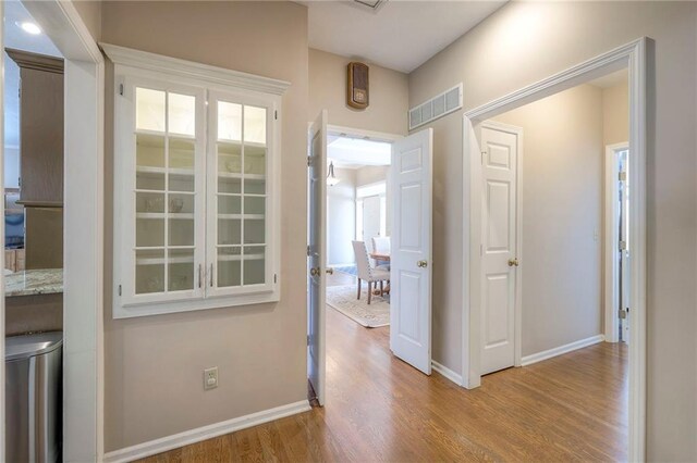 7904 W 153rd Ter, Overland Park, KS 66223 - hall with wood finished floors and baseboards