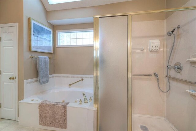 7904 W 153rd Ter, Overland Park, KS 66223 - bathroom with a shower stall, a jetted tub, and a skylight
