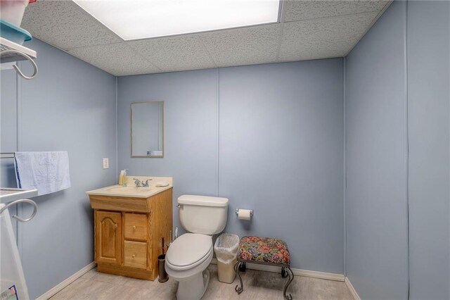 7904 W 153rd Ter, Overland Park, KS 66223 - half bathroom with a drop ceiling and vanity