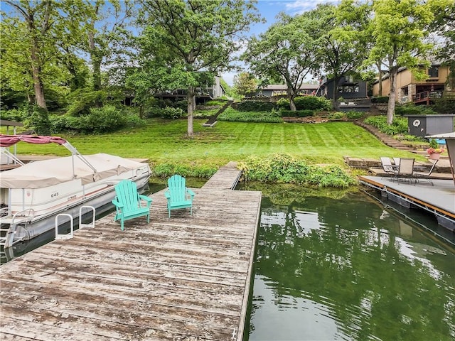 44 G St, Lake Lotawana, MO 64086 - dock area featuring a lawn and a water view