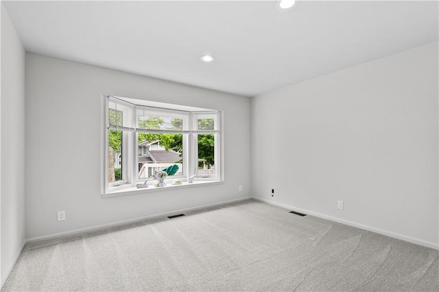 44 G St, Lake Lotawana, MO 64086 - unfurnished room featuring carpet flooring, baseboards, and recessed lighting