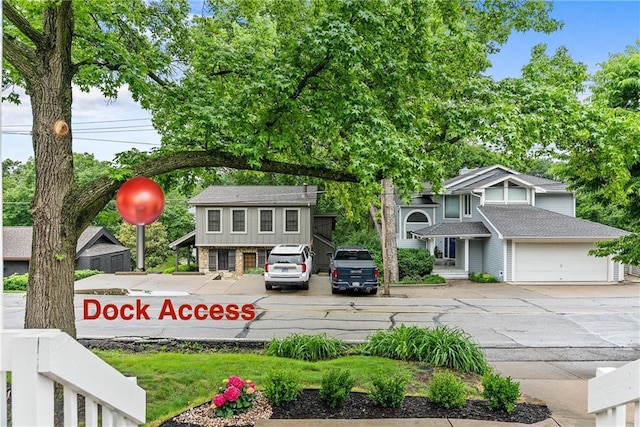 44 G St, Lake Lotawana, MO 64086 - exterior space with concrete driveway