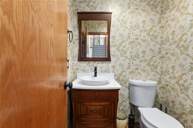 2432 SE 6th St, Lees Summit, MO 64063 - half bath with vanity and wallpapered walls
