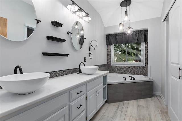 2432 SE 6th St, Lees Summit, MO 64063 - full bath featuring a garden tub, double vanity, and wood finished floors