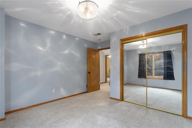 2432 SE 6th St, Lees Summit, MO 64063 - unfurnished bedroom featuring carpet floors and a closet