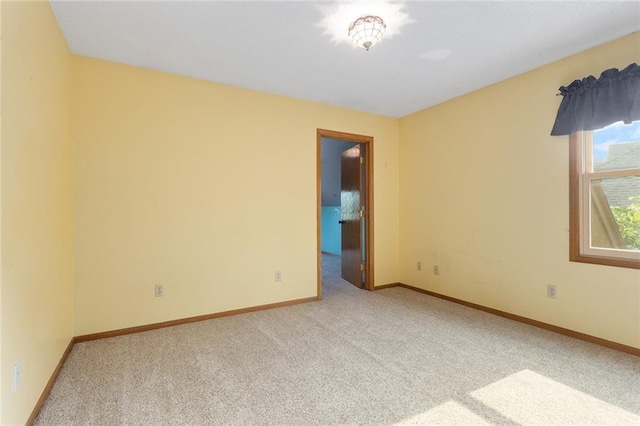 2432 SE 6th St, Lees Summit, MO 64063 - unfurnished room with carpet flooring and baseboards