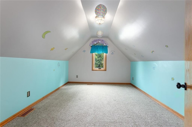 2432 SE 6th St, Lees Summit, MO 64063 - additional living space with carpet and lofted ceiling