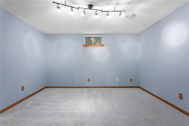 2432 SE 6th St, Lees Summit, MO 64063 - spare room with a textured ceiling and carpet flooring