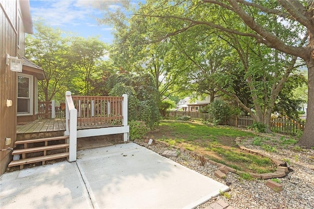 2432 SE 6th St, Lees Summit, MO 64063 - fenced yard featuring a patio area and a deck