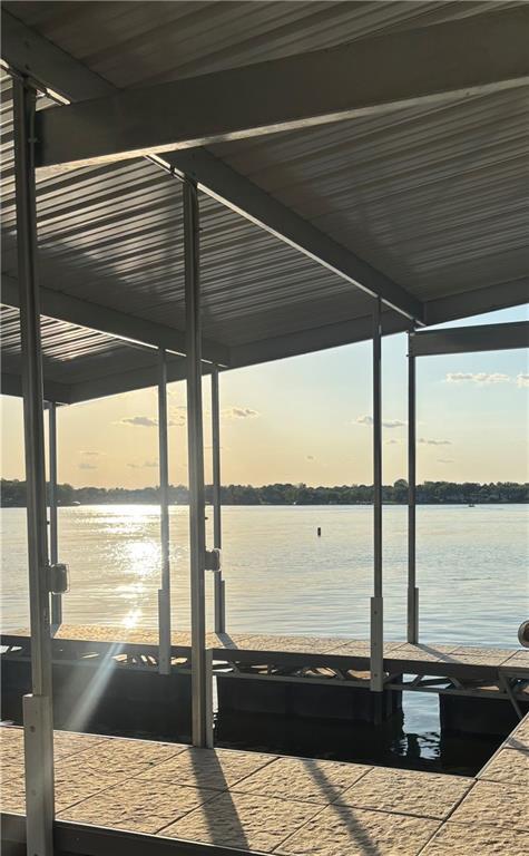 110 Cherokee Ln, Lake Winnebago, MO 64034 - dock area with boat lift and a water view