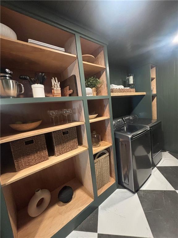 110 Cherokee Ln, Lake Winnebago, MO 64034 - storage room featuring washer and dryer