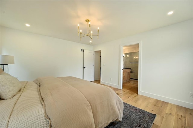 110 Cherokee Ln, Lake Winnebago, MO 64034 - bedroom with a chandelier, baseboards, light wood-style flooring, recessed lighting, and ensuite bathroom