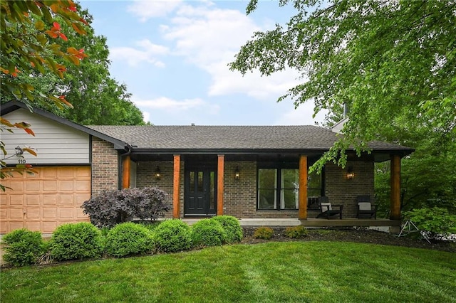 110 Cherokee Ln, Lake Winnebago, MO 64034 - rear view of property featuring covered porch, a lawn, brick siding, a garage, and roof with shingles
