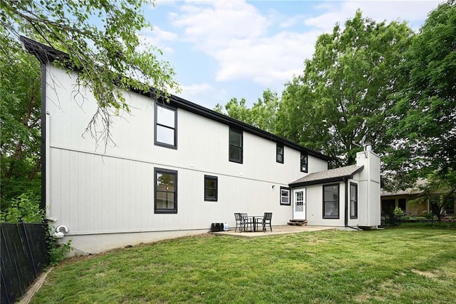 110 Cherokee Ln, Lake Winnebago, MO 64034 - rear view of property featuring a patio and a chimney