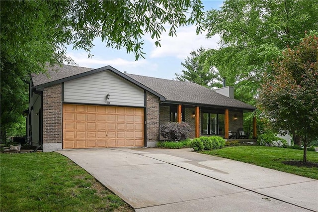 110 Cherokee Ln, Lake Winnebago, MO 64034 - view of front of house featuring a garage, concrete driveway, a front yard, a porch, and brick siding